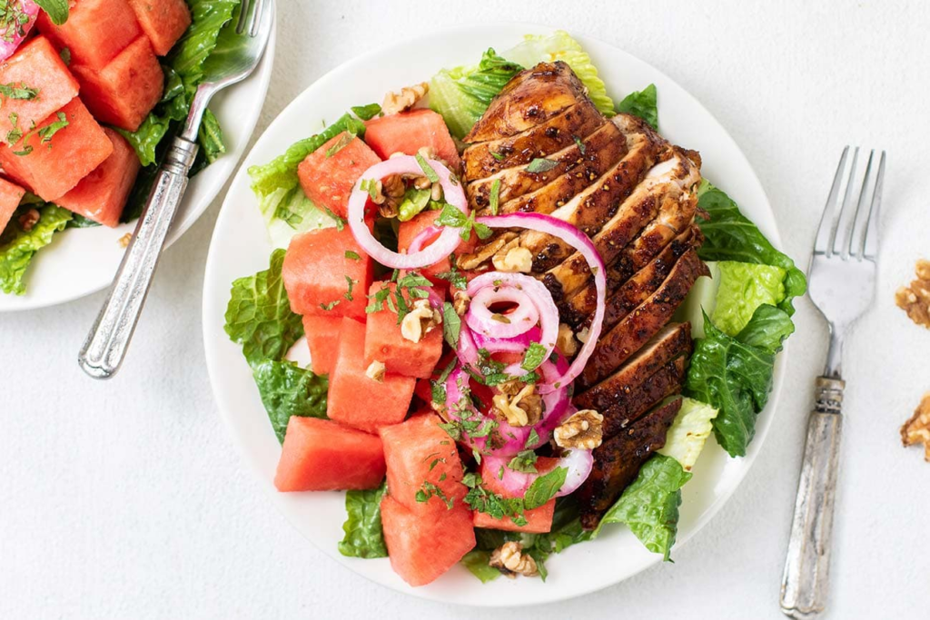 Refreshing watermelon feta salad with grilled chicken - a perfect summer meal.